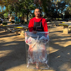 Whole lamb ready for on-site roast catering at a Bay Area private event
